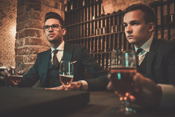 Young gentlemen tasting craft beer
