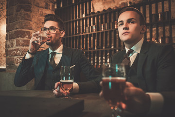 Young gentlemen tasting craft beer