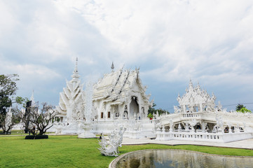 Wat Rong Khun (White Temple) - art exhibit in the style of a Buddhist temple in Chiang Rai Province, Thailand