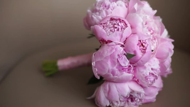 Wedding bouquet of fresh pink peonies