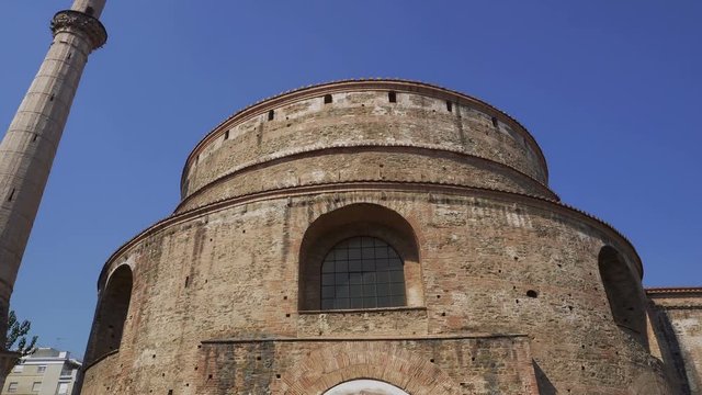 Rotunda of Galerius cylindrical structure in Thessaloniki Greece external view.
Day view of the 4th-century monument with minaret, also called Agios Georgios church at the city center on a sunny day.