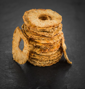 Portion of Dried Pineapple Rings on a slate slab