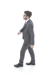 Successful business man confidently goes forward