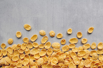 Corn flakes on table background. Cereal breakfast