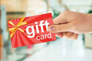Person's Hand Holding Gift Card