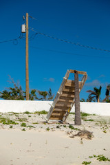 utility pole and staircase on the beach - 169883831
