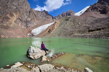 Happy woman in the mountains