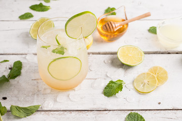 healthy lemonade lime with mint and ice in a glass