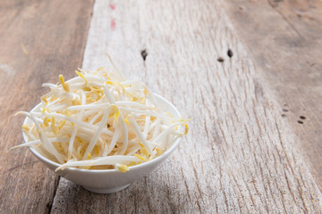 Bean sprouts on wood background
