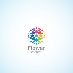 Bright flower with multi-colored petals logo.