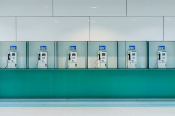 Line of public telephones. They are installed in hallways.
