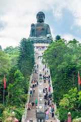 Naklejka premium Tian Tan Buddha on mountain. It is a large bronze statue of Buddha Shakyamuni.