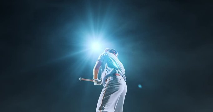 Baseball player is happy on foggy background