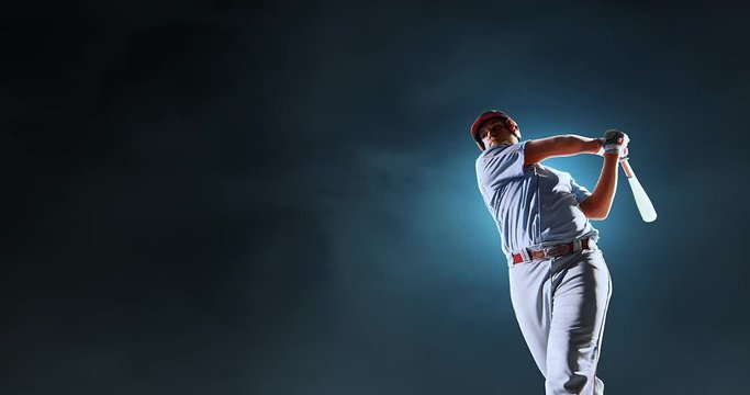 Baseball player is happy on foggy background