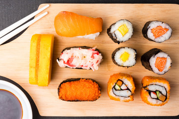 Top view of Sushi set on wooden tray background, Japanese food.