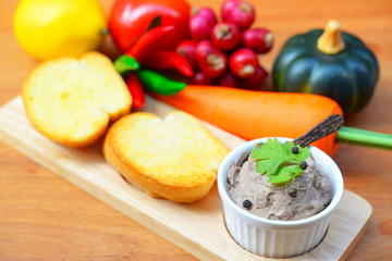 Fresh homemade chicken liver pate on bread 
