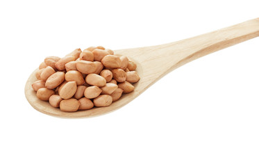 Raw peanut with wooden spoon on white background.clipping path.