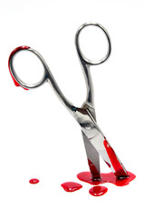 scissors with blood on a white background