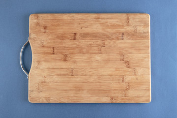 kitchen cutting board  on a blue