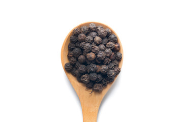 Whole Black Pepper On Wooden Spoon isolated on white background