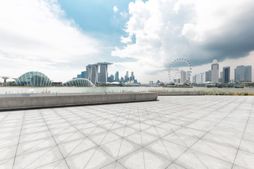 Fototapeta premium empty marble floor with cityscape of modern city