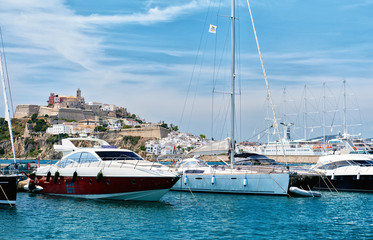 Obraz premium Dalt Vila old town and moored vessels in the port of Ibiza. Spain