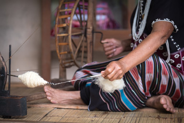 women weaving traditional cotton woven
