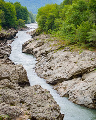 Summer landscape with mountain river. Belaya River in Republic of Adygea, Russia