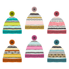 Set of multicolored knitted hats. Freehand drawing. Can be used for scrapbook, postcards, print, etc.