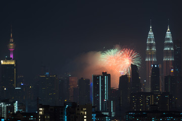 Fototapeta na wymiar KUALA LUMPUR, MALAYSIA - 31ST AUGUST 2017; Fireworks show at Kuala Lumpur city centre during 60th Malaysia Hari Merdeka Celebration (Independence Day).