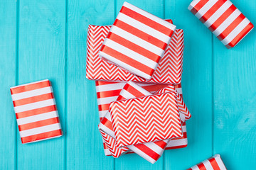 Fototapeta premium Many gifts in a red and white wrapper