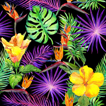 Tropical leaves, exotic flowers. Seamless pattern on black background. Watercolor