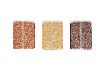 Red Jasmine Rice, Jasmine Brown Rice and Riceberry in Plastic Clear Bag on White Background, Clipping Path