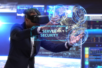 Business, Technology, Internet and network concept. Young businessman working in virtual reality glasses sees the inscription: Server security