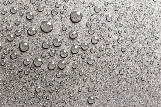 Silver Surface With Rain Drops