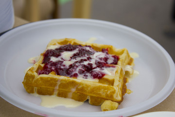 dessert with soft waffle and raspberry jam