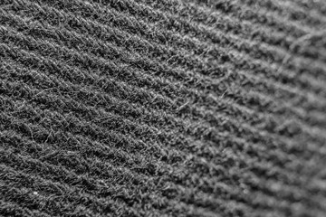 Macro the surface of the black canvas.