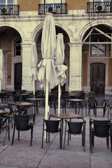 Outdoor street cafe tables in Lisbon