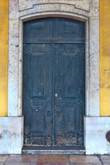 Old door in the city of Lisbon, Portugal