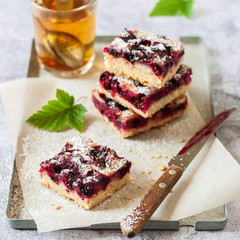 Black Currant Slice with a Glass of Tea
