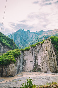 View of mountains Babadag and a muddy river Girdimanchay Lahij yolu from the side in Lahic village, Azerbaijan