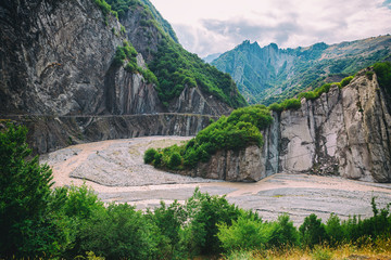View of mountains Babadag and a muddy river Girdimanchay Lahij yolu from the side in Lahic village,...