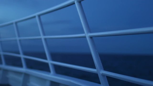 A medium shot of a boat's dock and railings