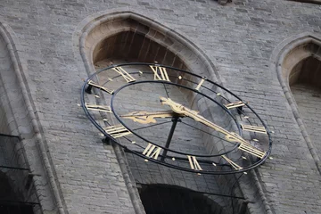Fotobehang Clock on church in Brielle (NL) © Leen