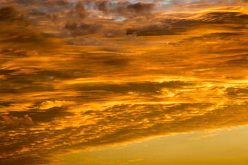 Beautiful clouds at sunset, improbable sky