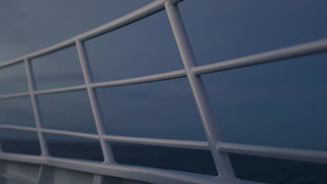 A medium shot of railings of a boat
