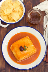 tradirional portuguese dish francesinha on dish