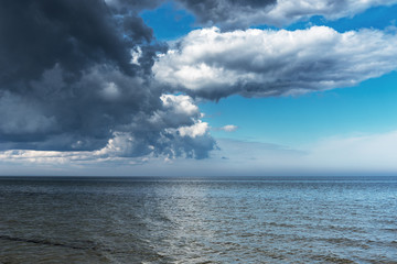 Obraz premium Stormy clouds above Baltic sea.