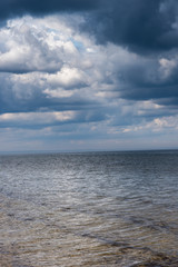 Fototapeta na wymiar Stormy clouds above Baltic sea.