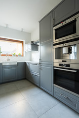 Kitchen with olive green cabinets